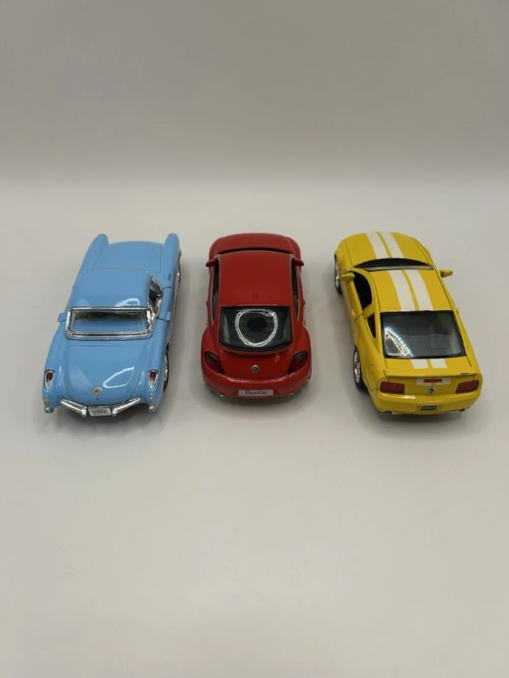 Lot of 3 Diecast Cars Corvette VW Beetle Mustang Kinsmart Scale Blue Red Yellow